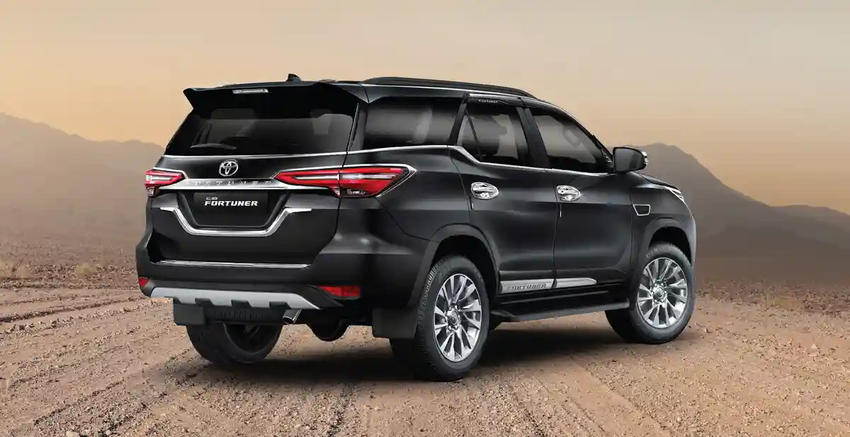 Fortuner rear three-quarter in open country