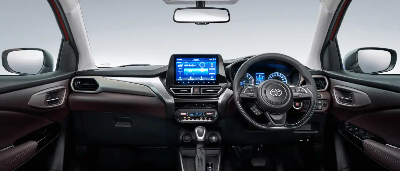 Urban Cruiser Taisor cabin — dashboard, touchscreen, digital instrument cluster and steering wheel